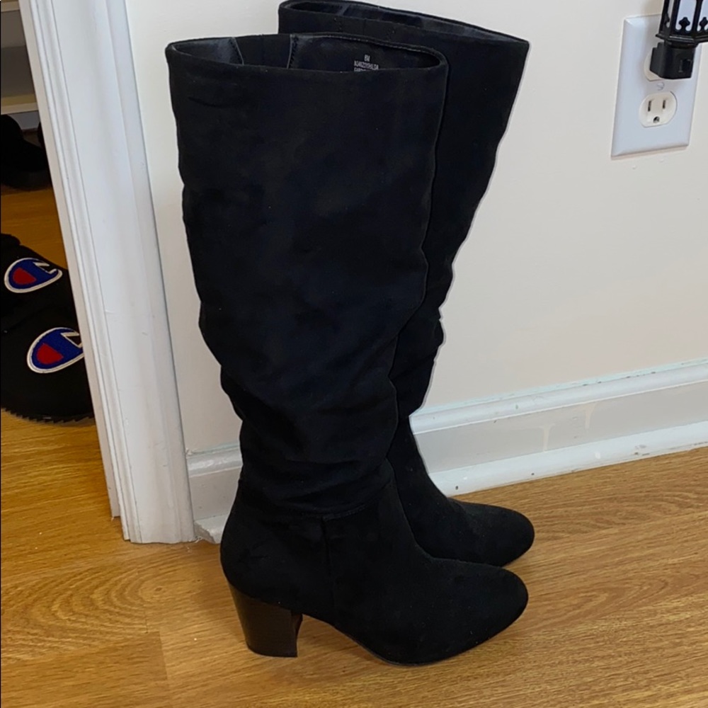 Black below the knee boots